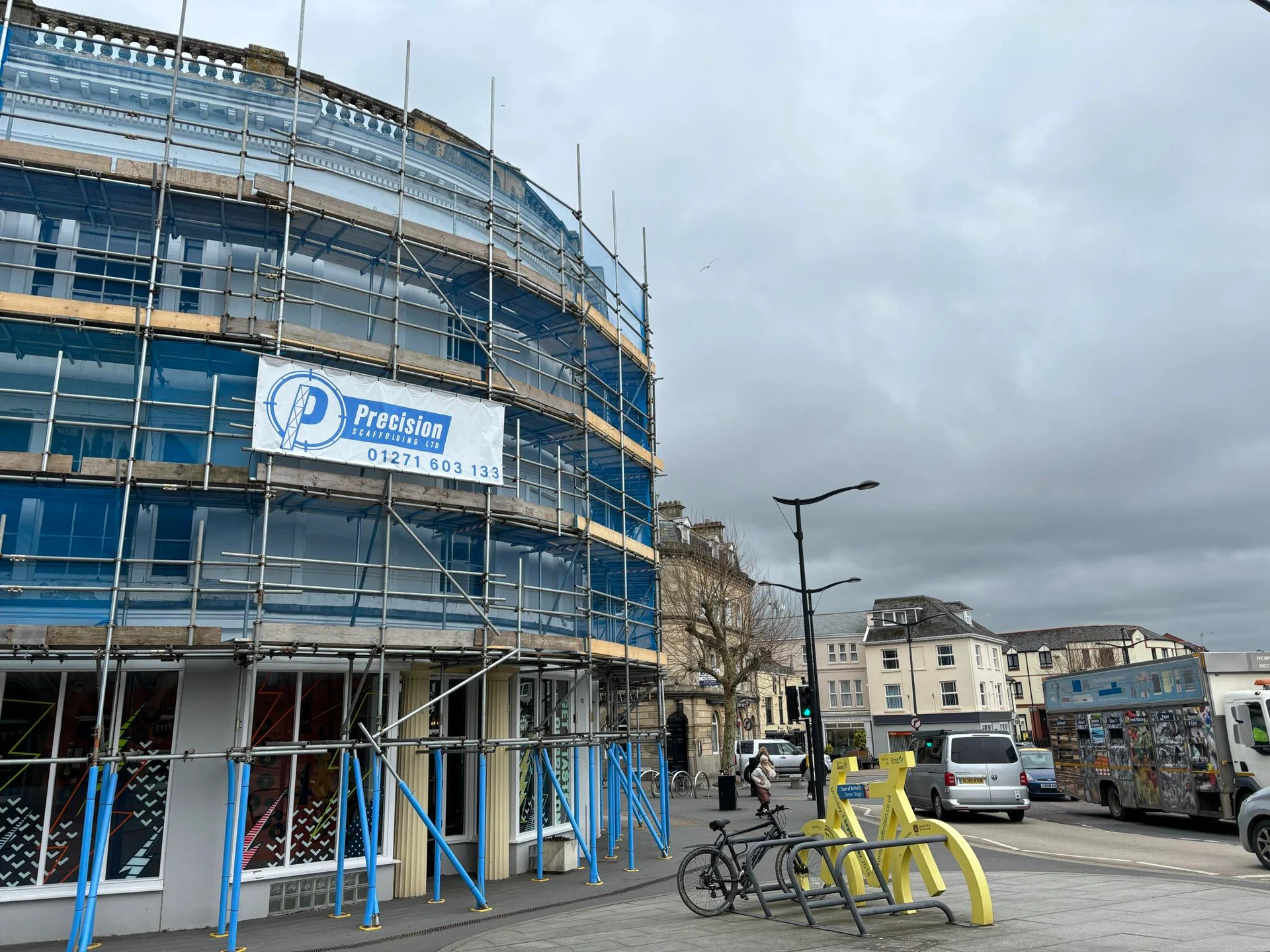 Scaffolding on Bridge Buildings during renovation with blue protective covering