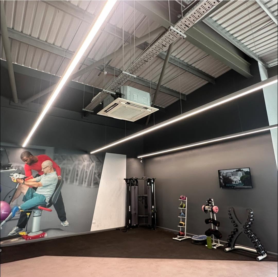 Tarka Leisure Centre gym area with bright LED lighting and freshly painted walls